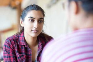 young woman engaged in a motivational interviewing session