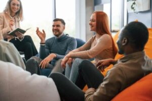 a group of young men and women in an addiction treatment program from a variety of areas we serve across North Carolina