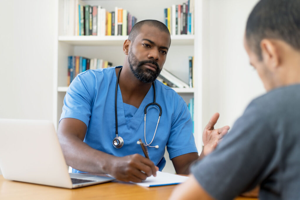 behavavioral health professional explaining to client what is outpatient rehab