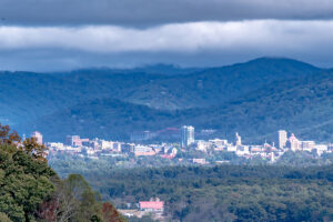 scenic view of town nestled in the mountains symbolizing that finding a cocaine rehab center in Arden, NC is possible.